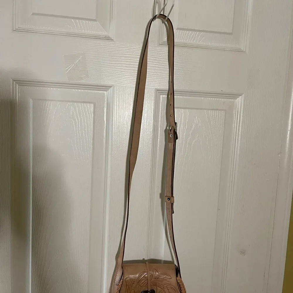 VTG Leather tan tooled small Crossbody Bag hook and loop closure.